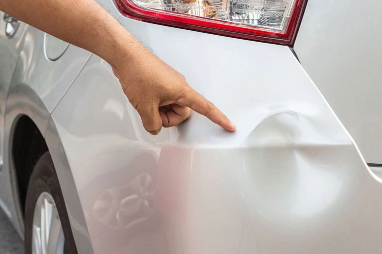 Car Dent about to be repaired by quality technicians